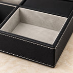 Black faux leather valet tray with 5 compartments, close-up of the materials and finish