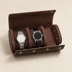 Dark brown genuine leather watch roll open with two watches on its pillows