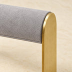 Close-up of the soft gray bar and the brushed gold-tone metal