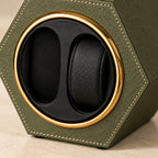 Close-up of the pillow, metal ring and stitched leather
