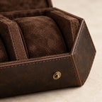 Close-up of the brown lining, a pillow and a snap stud on the hexagonal case