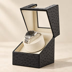 Black ostrich-texture mini watch winder, lid open, white interior