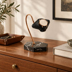 Marble hook watch stand on a chest of drawers, for scale