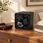 Open-front 3-watch winder on a wooden chest of drawers