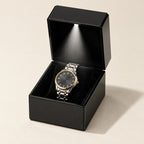Single watch box with LED light in high-gloss black, open with a lit watch