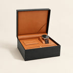 Single watch presentation box in black, open with a watch on its pillow