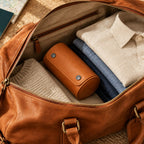 Single watch roll packed in a leather weekender bag, for scale