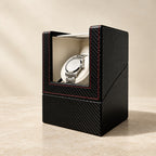 Carbon-fiber single watch winder with a watch on its pillow