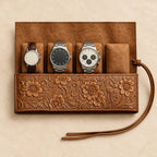 Tooled cowhide leather watch roll with 4 pockets, from above, with watches of different sizes