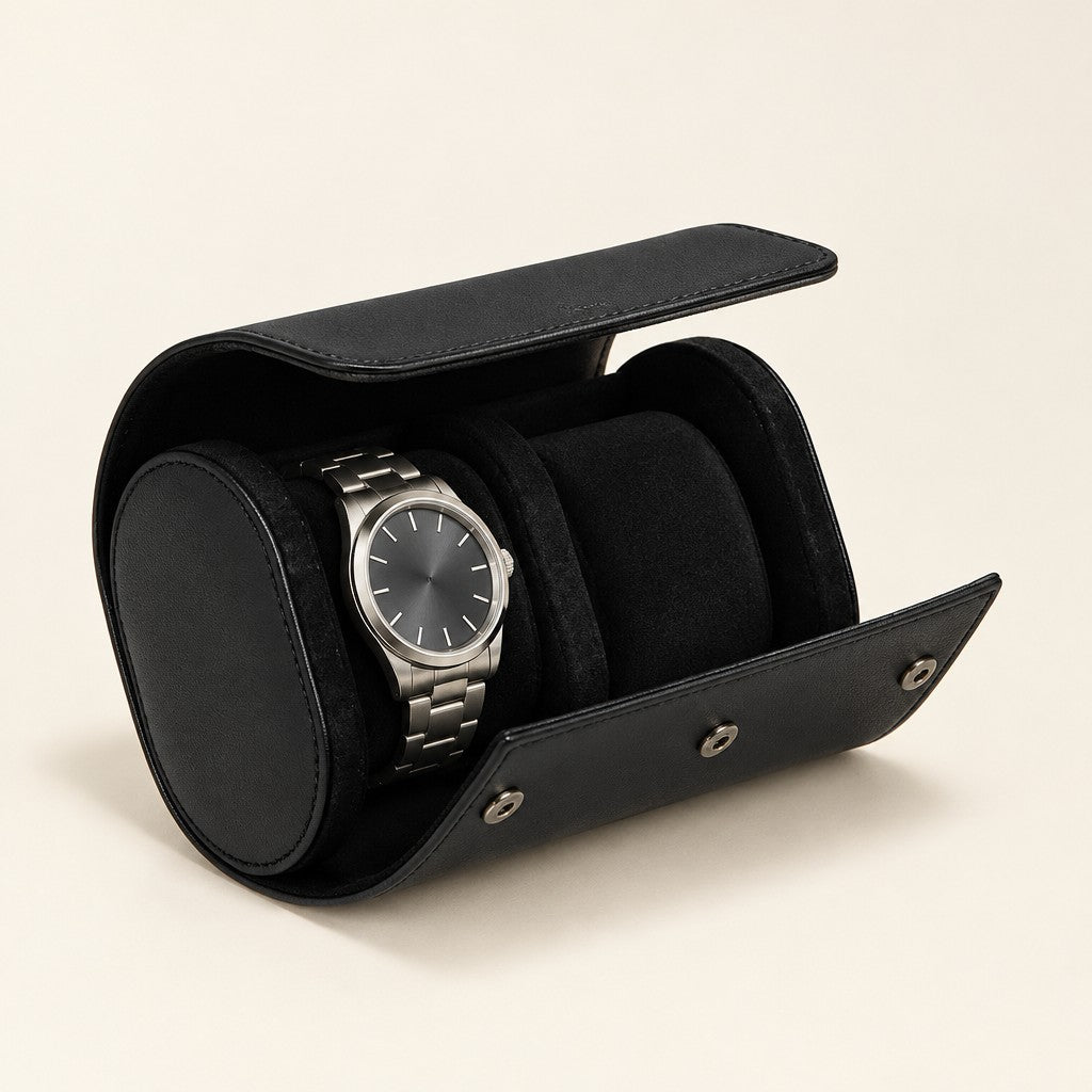Black travel watch roll open with a watch