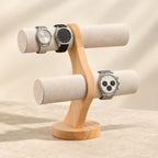 Curved wooden watch stand with watches of different sizes