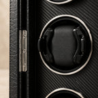 Close-up of a cushioned winding cup and the door hinge