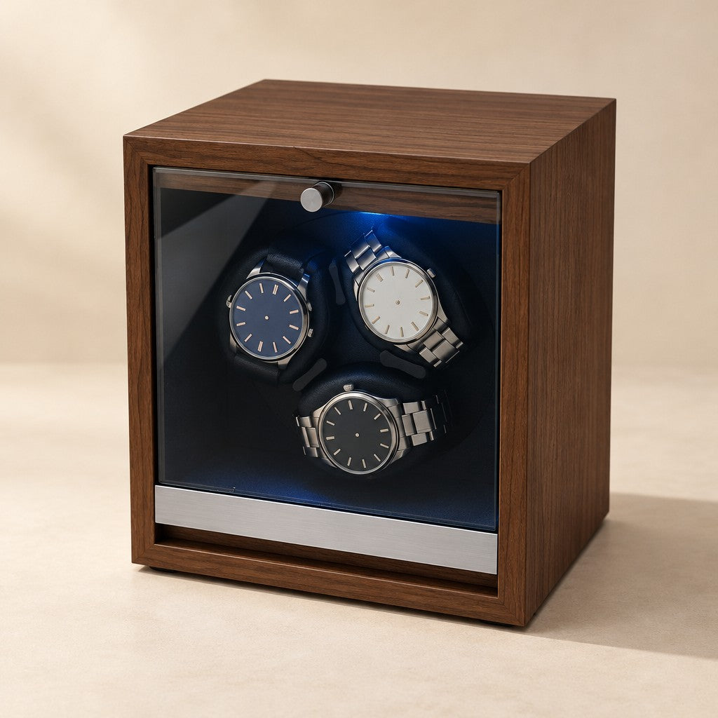 Walnut 3-watch winder with three watches behind its glass door