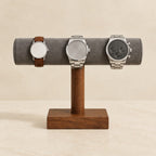 Long velvet bar holding a 36 mm, a 42 mm and a 45 mm watch side by side