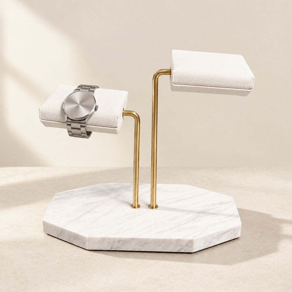 White marble two-tier watch stand with white pillows