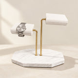 White marble two-tier watch stand with white pillows