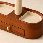 Close-up of the beige lining and the brass drawer knob