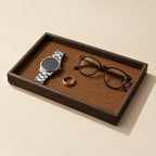 Woven valet tray with a dark wood-grain frame, three-quarter view